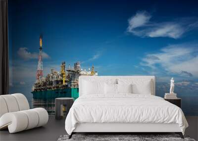 FLNG or floating  liquefied natural gas at sea with beautiful cloudy sky Wall mural