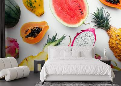 flat lay tropical fruit layout made of dragon fruit, watermelon, papaya and pineapple on a white bac Wall mural