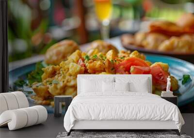 Close-up Photo of Traditional Jamaican Ackee and Saltfish with Fresh Vegetables on Blue Plate Wall mural