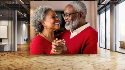 Senior couple dancing in a living room, intimate moment, lifelong love Wall mural