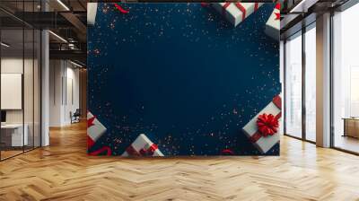 Festive Christmas Gifts with Red Ribbons and Glitter on Blue Background Wall mural