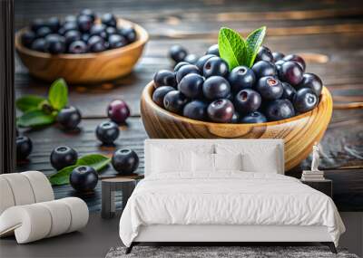 Fresh organic acai berries in a wooden bowl , healthy, superfood, antioxidant, nutrition, tropical, Brazil, purple, ripe Wall mural