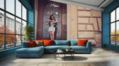 Young stylish pretty couple Wall mural