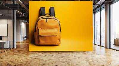 Faux leather backpack isolated on yellow background. Copy space. Wall mural