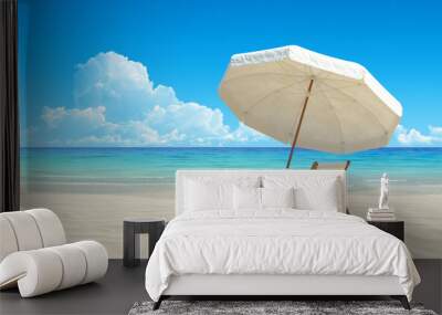 Beach chair and umbrella on idyllic tropical sand beach Wall mural