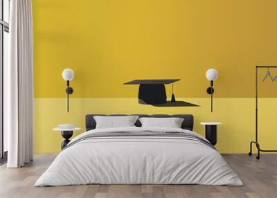 a black graduation cap on a yellow background. Wall mural