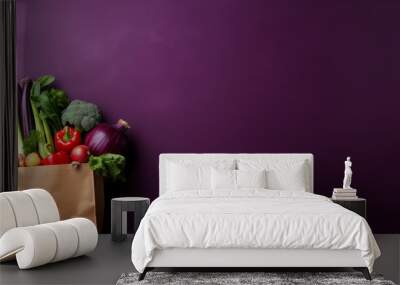 vegetables in cloth bags on purple background. Wall mural