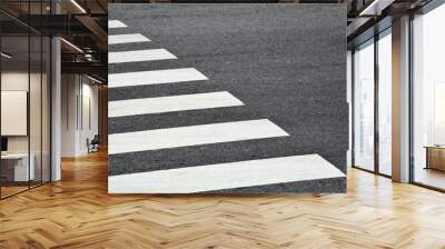 Zebra crosswalk on a asphalt road - closeup background Wall mural