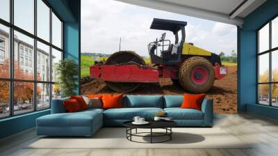 Bulldozer at land clearing construction site Wall mural