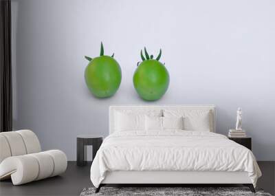 Green tomatoes on isolated white background Wall mural