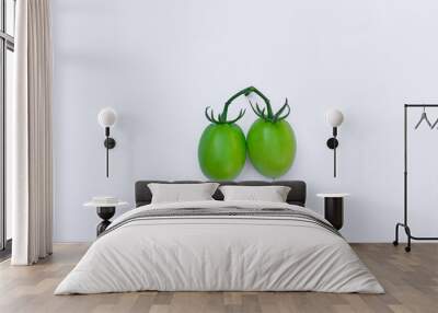 Green tomatoes on isolated white background Wall mural