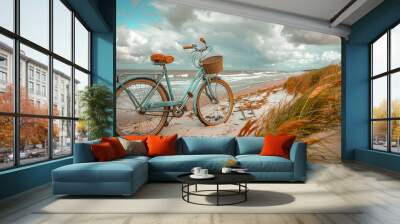 On vacation with a bike. A parked bicycle on the beach by the sea. Wall mural