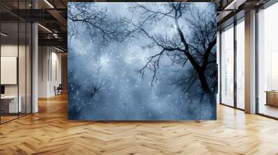 Magical winter landscape with bare trees in snow flurry Wall mural