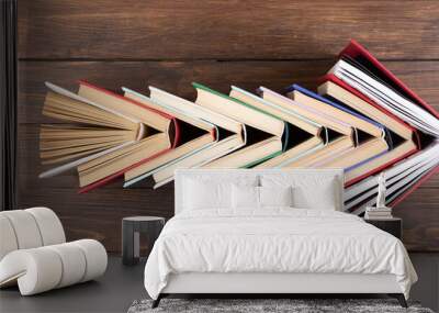 Arrow Shape made of books love to wisdom, science and education. Reading and writing concept Wall mural