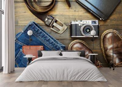 set of old boots on wooden background Wall mural