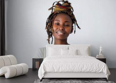 African woman with dreadlocks standing over white background smiling looking to the camera Wall mural