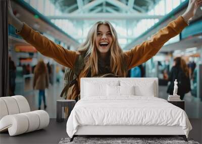 excited woman wears a backpack in the airport Wall mural