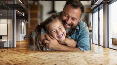 portrait of caring father embracing happy girl Wall mural