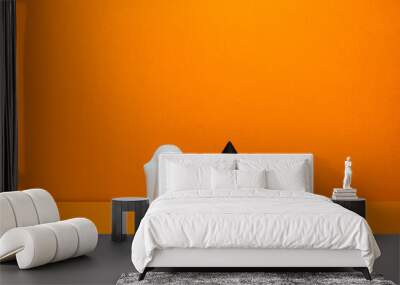 Orange Halloween background with ghosts and pumpkins Wall mural