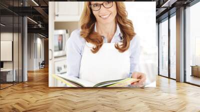 middle age woman portrait at kitchen Wall mural