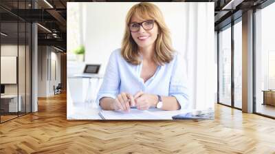 Successful businesswoman working at modern office Wall mural