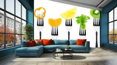 Color fruits and vegetables on fork Wall mural