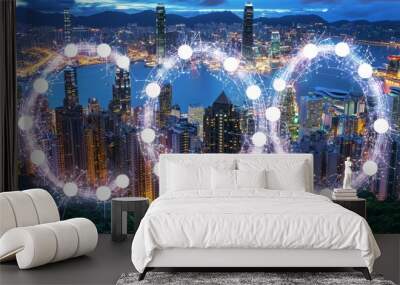 The digital network connection lines of Hong Kong Downtown and Victoria Harbour. Financial district in a smart city in technology concept. Skyscrapers and high-rise buildings at night. Wall mural