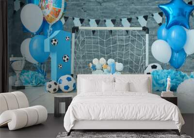 Festive background decoration for birthday with cake, letters saying one and blue balloons in studio, Boy Birthday .Cake Smash first year concept. birthday greetings. Wall mural