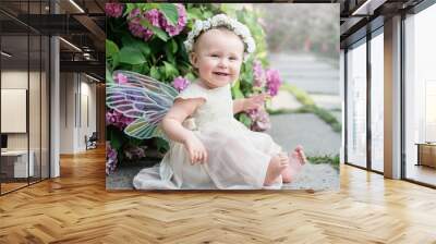 girl with butterfly wings in hydrangea park Wall mural