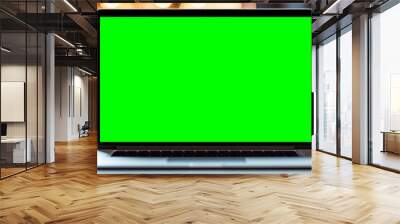 A laptop with a green screen on a table. Generative AI. Wall mural