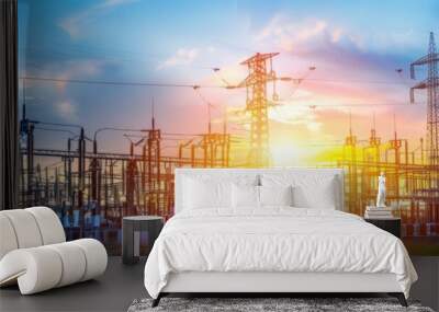 A large electrical substation with a sunset in the background. AI. Wall mural