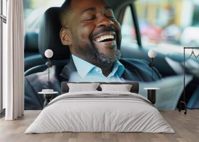 A man laughs while sitting in a car. AI. Wall mural