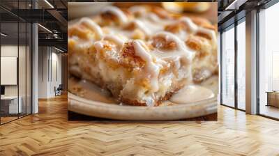 A slice of sweet bread pudding with a creamy glaze. AI. Wall mural