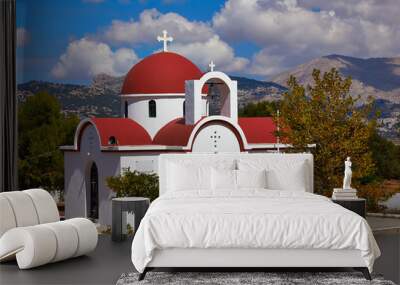 Classic greek orthodox small church in village, Crete, Greece. Wall mural