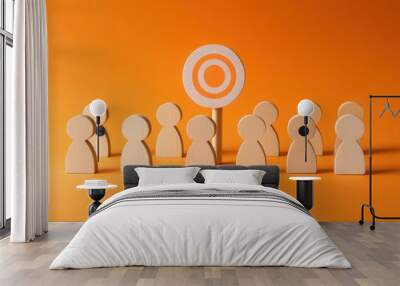 target audience, customer group or member of team on orange background with wooden people icons and bullseye for business concept  Wall mural