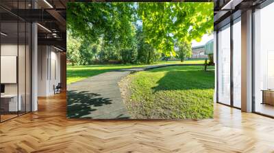 A park with a path and a wagon Wall mural