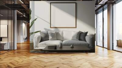 A white couch sits in front of a large empty frame Wall mural