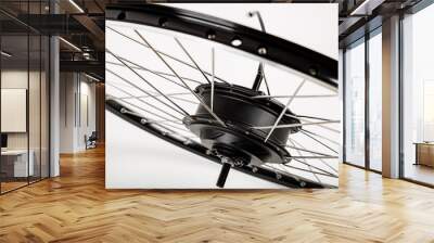 Electric motor on a bicycle wheel. White background. Wall mural