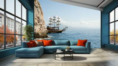 pirate ship on the sea with people Wall mural