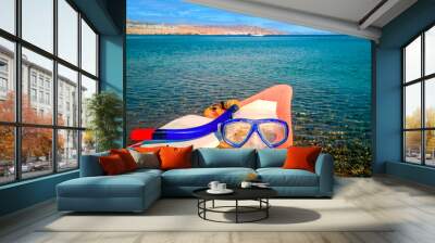 Morning at sandy beach of the Red Sea with kayak boat and snorkel equipment , Middle East Wall mural