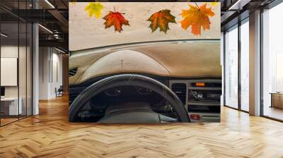 Windshield of car in autumn Wall mural