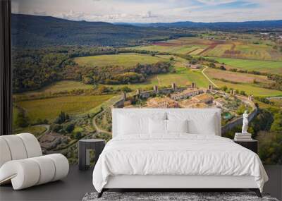 aerial view to landscape and medieval castle Monteriggioni in Tuscany in Italy from drone Wall mural