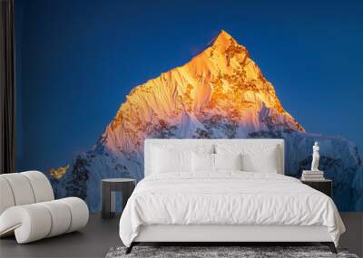 view to golden mountains peak in sun light under blue sky with copy space Wall mural