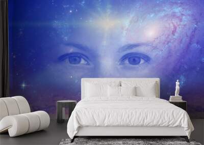 the eyes of a clairvoyant in space against the background of the starry sky and galaxies. The concept of clairvoyance, esotericism or astrology. Elements of this image furnished by NASA Wall mural