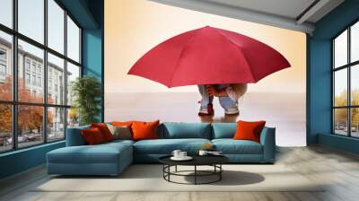  Little girl hiding under big red umbrella. Domestic violence and abused concept. Wall mural