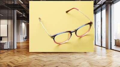 Blue and pink frame of glasses Wall mural