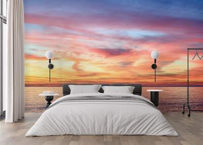 Colorful sunset over the winter sea Wall mural