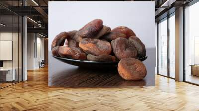 dried apricots on a wooden table Wall mural