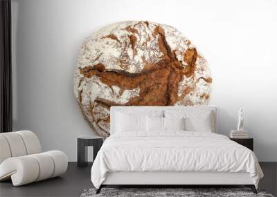 Freshly baked rustic bread isolated on white background, top view Wall mural