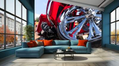 Motorcycle close-up. Detail of a beautiful powerful chrome motorcycle wheels. The concept of freedom and travel. custom works. Metallic shiny new internal combustion engine Wall mural